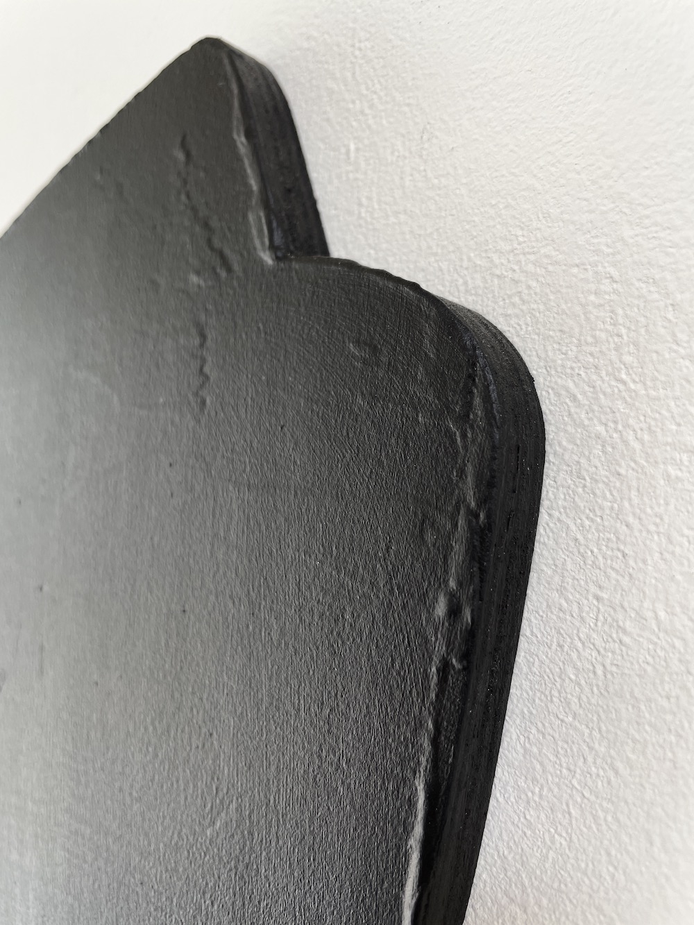 Composite shape of 4 parts in black