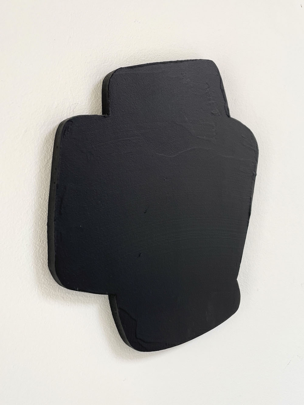 Composite shape of 4 parts in black