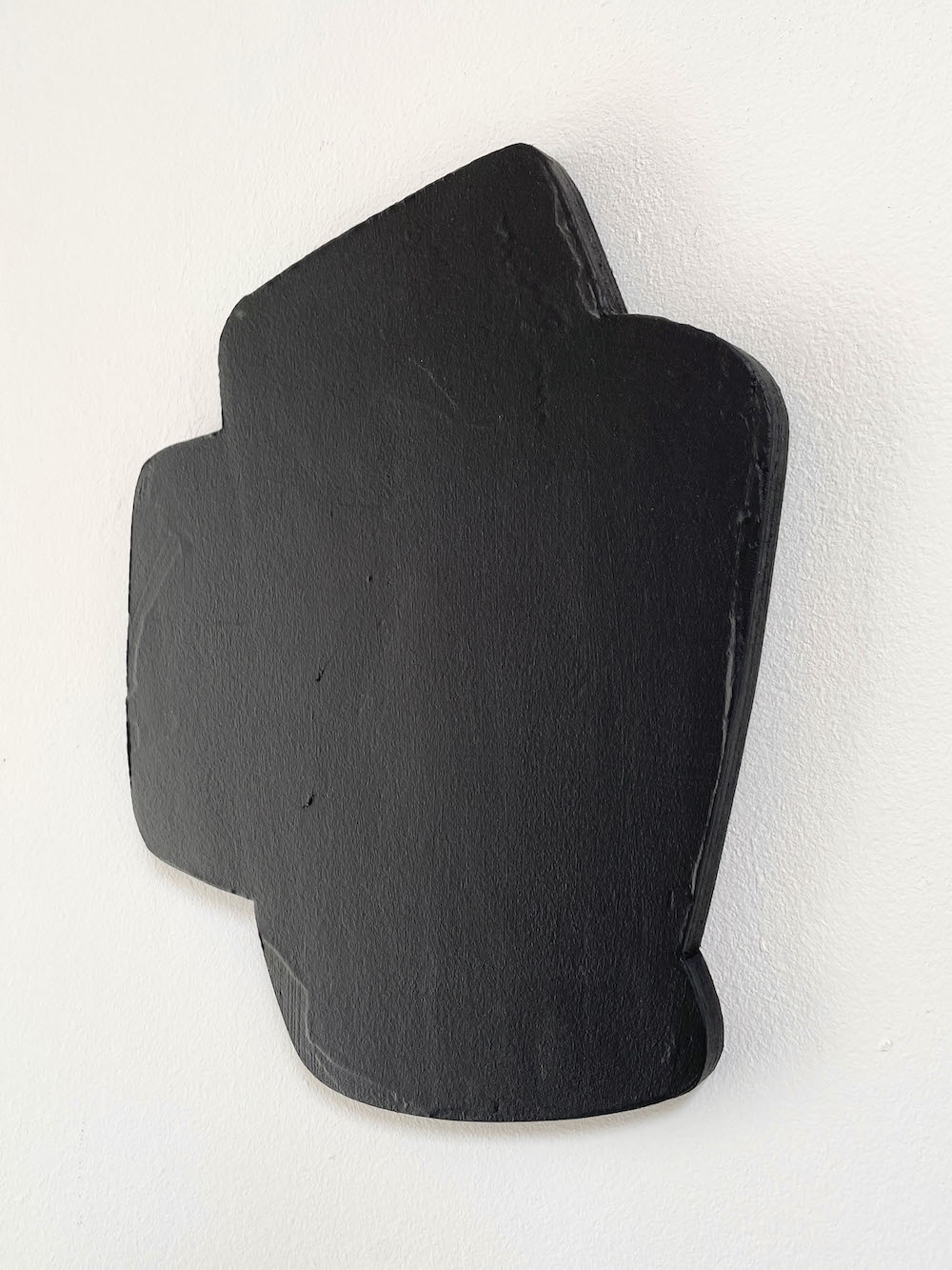 Composite shape of 4 parts in black