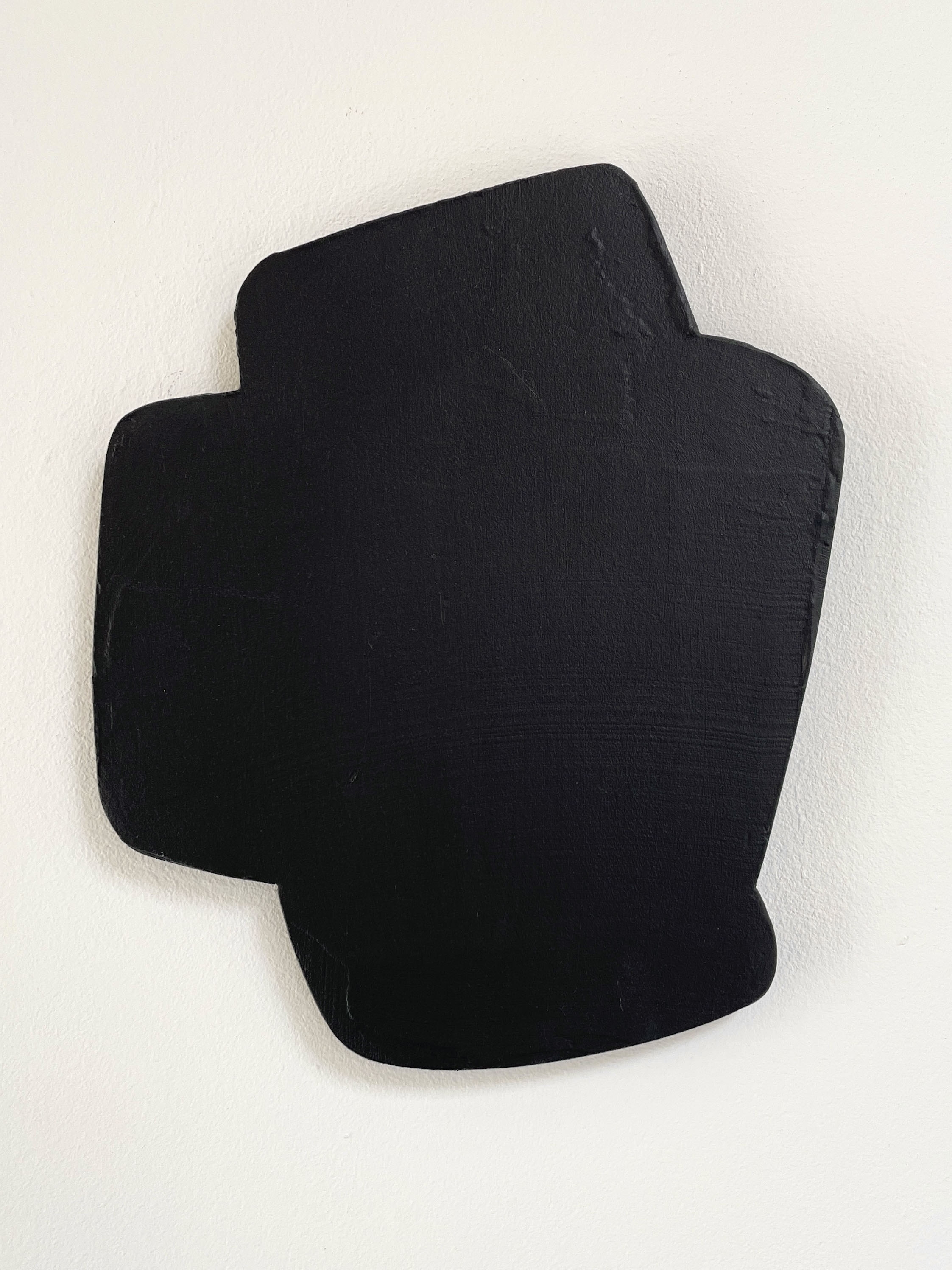 Composite shape of 4 parts in black