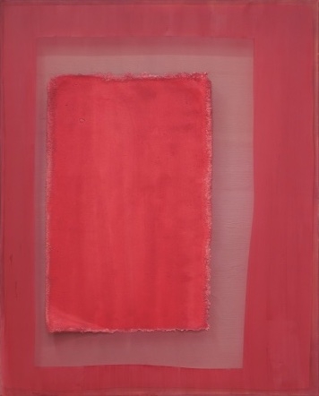 Composition of dark cherry colored paper on dark