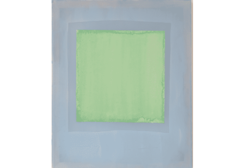 Composition of lemon green coloured paper on indigo blue