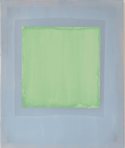Composition of lemon green coloured paper on indigo blue