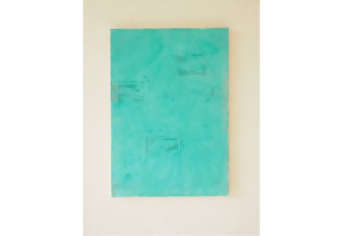 Composition of lemon green coloured paper on indigo blue