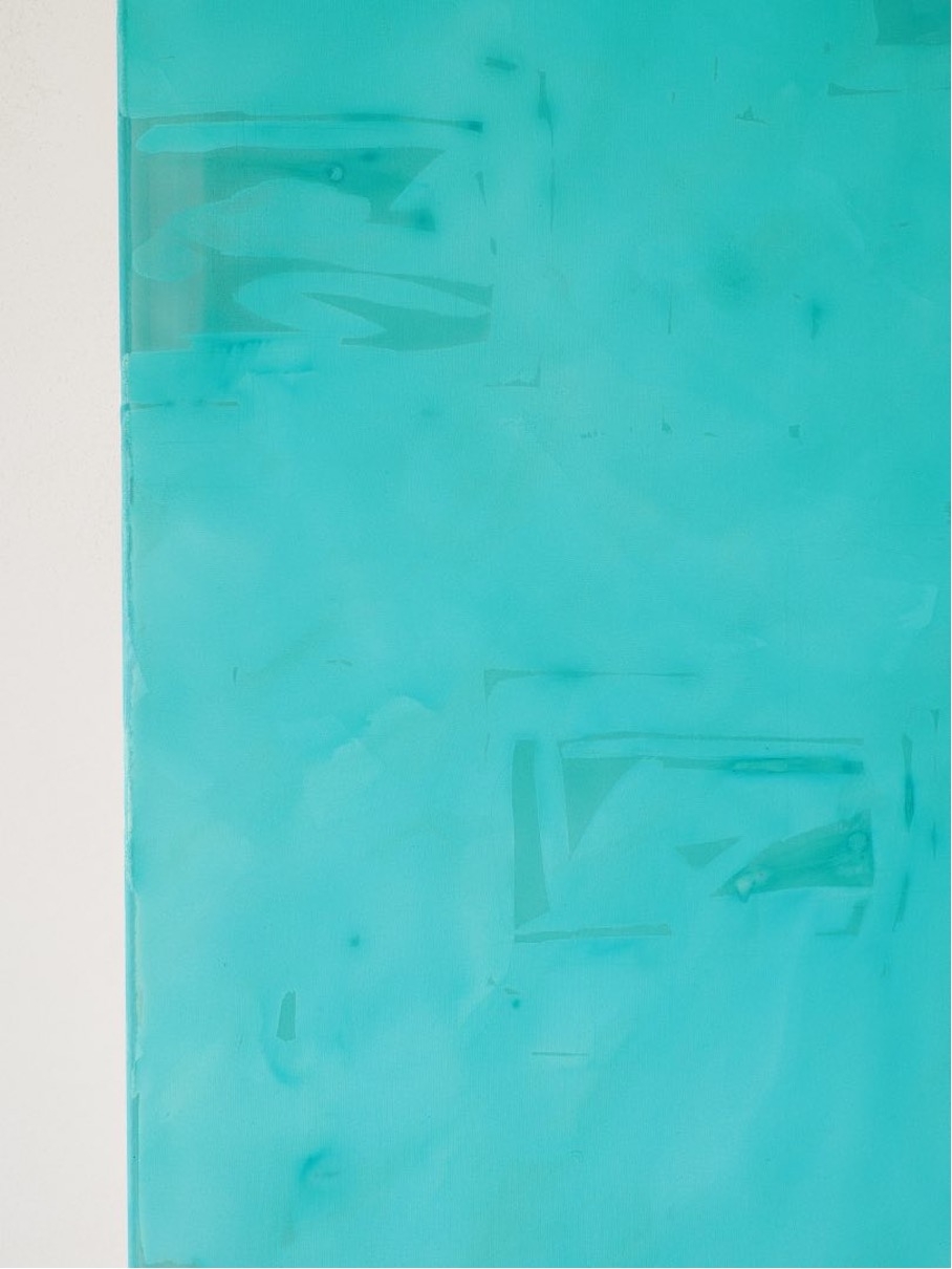 Composition of lemon green coloured paper on indigo blue