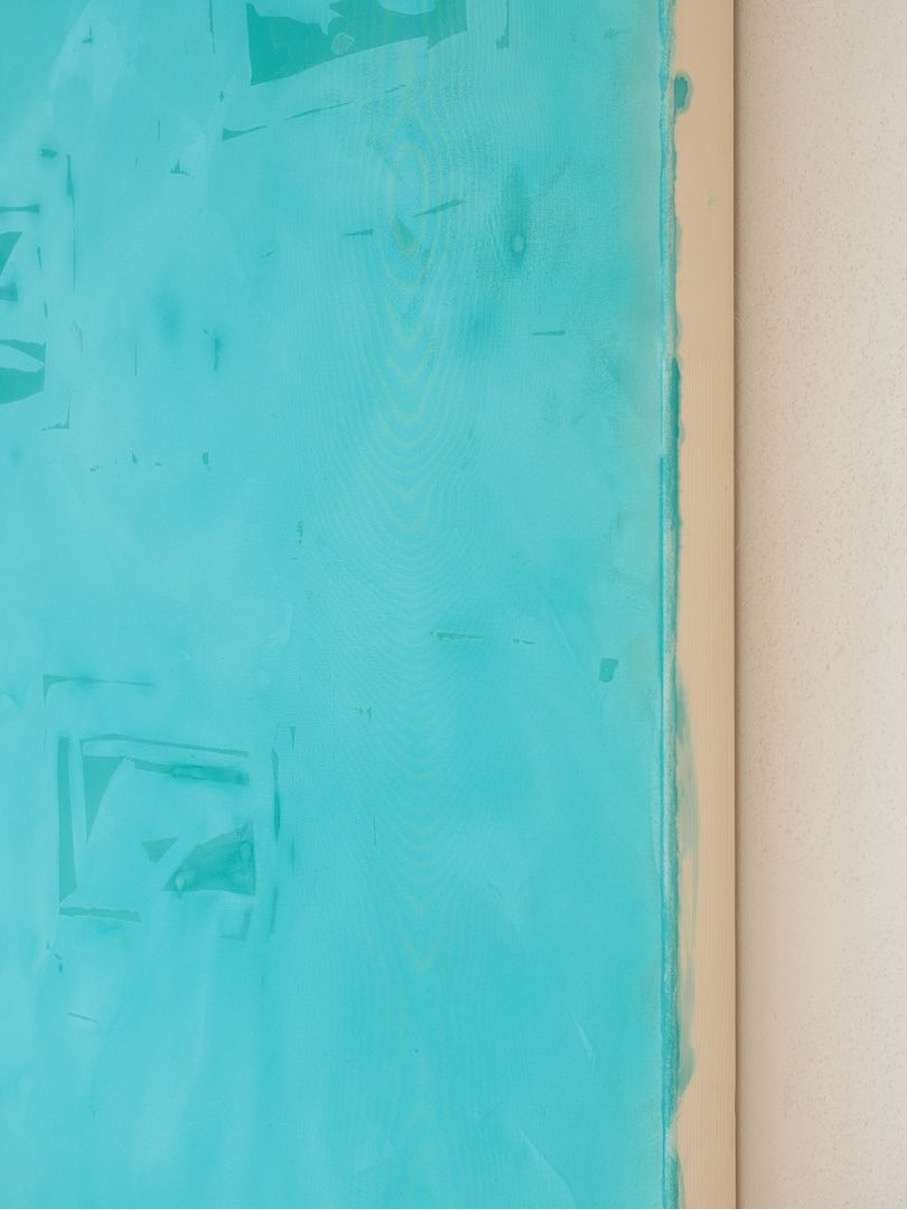 Composition of lemon green coloured paper on indigo blue