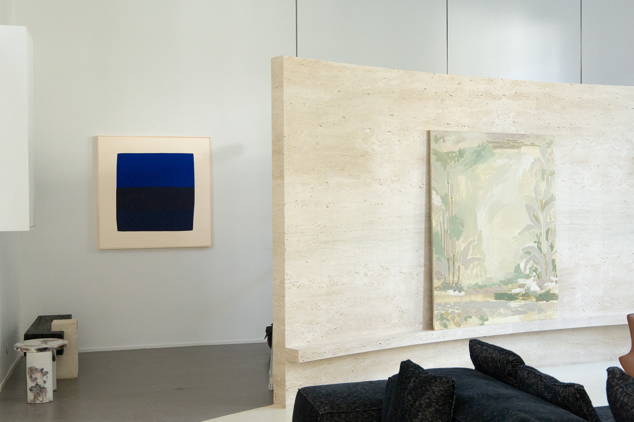 A hanging of works by Ethan Caflish and Bonnie Colin